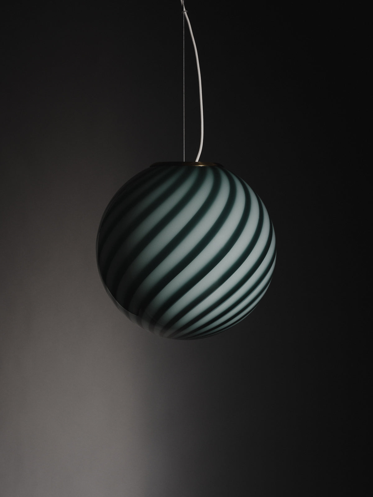 limited edition Murano Vetri glass pendant sculptural sphere-shaped pendant crafted from mouth-blown swirl opaline glass in Petrolio: a deep and rich shade of green. Brass fitting hardware suspension. Murano pendel lampe I grøn glas med swirl. Copenhagen Venice